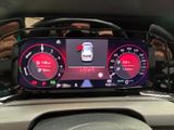 the dashboard of a car with a digital display on it