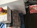 a white box with a red apple on top of it