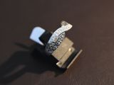 a ring that is sitting on top of a piece of metal