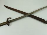 pair of two swords on a white surface with a white background