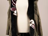 an image of a woman ' s coat on a mannequin mannequin
