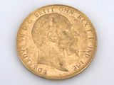 an image of a gold coin on a white surface