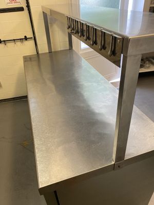 a stainless steel counter in a commercial kitchen