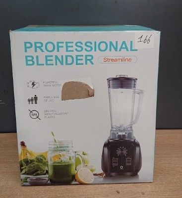 un carton contenant un mixeur posé sur une table