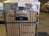 a cart that has many boxes on it in a warehouse