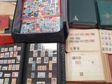 many different types of stamps on the table