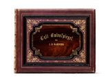 an old book with a wooden cover and gold lettering on it