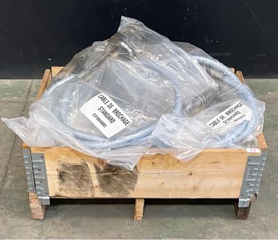 a wooden box with a bunch of plastic bags on top of it