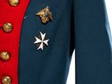 a close up of a military uniform with a star on the chest