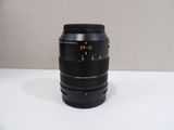 a close up of a camera lens sitting on a table