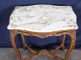 marble top side table with carved wood legs