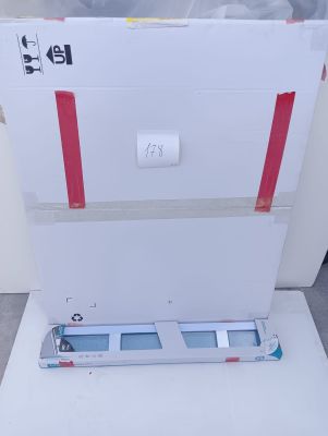 a white box with a red stripe on it sitting on the floor