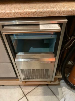 an image of a microwave built into a kitchen counter