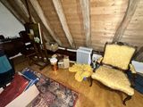 a room with a chair and a table in it