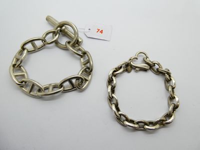 two silver bracelets and a chain bracelet