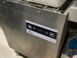 a dishwasher that is sitting next to a counter