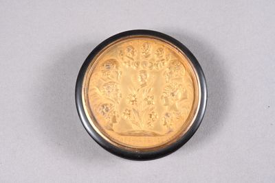 an image of a gold coin on a white surface