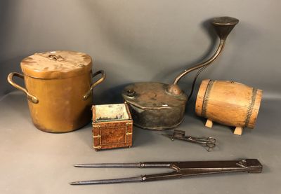 an image of a collection of antique tools and items on a table