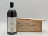 une image d'une bouteille de vin à côté d'une caisse en bois