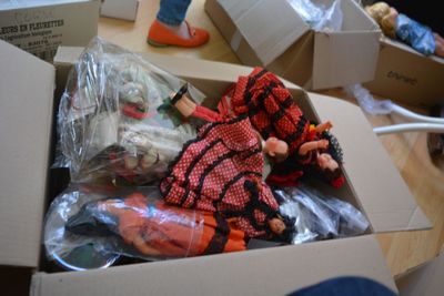 a box full of toys sitting on a table