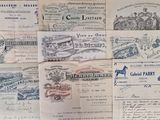 several different types of stamps are on top of a wooden table