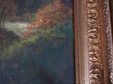 a picture of a painting hanging on a wall in a room