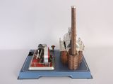 a picture of a miniature model of a factory on a tray