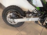 a dirt bike that is sitting on the ground