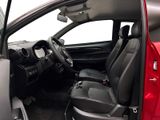 a red car with black seats in the back of it