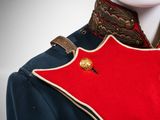 an image of a mannequin wearing a red and blue uniform