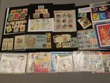 many different types of stamps on display on a table