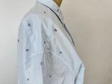 a picture of a blue and white shirt on a mannequin head