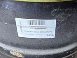 a close up of a metal barrel with a barcode on it