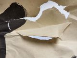 a piece of paper that has a picture of a cat on it