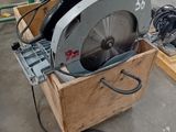 a picture of a circular saw in a wooden box