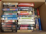 a lot of dvds in a box on the table