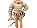 a figurine of a man with a sword in his hand