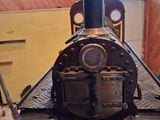 a model of a train sitting on display in a museum