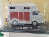 a white and red truck in a plastic package