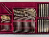 silverware in a red case with spoons, forks, spoons and spoons