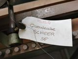 a piece of paper that has been pinned to the back of a machine