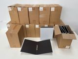 a pile of boxes and a book on a table