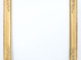 an antique gold frame with a white background