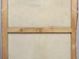 a painting of a wooden frame sitting on top of a white wall