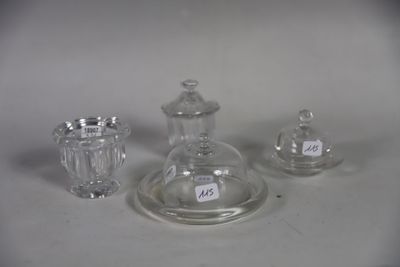 three glass objects that are sitting on a table