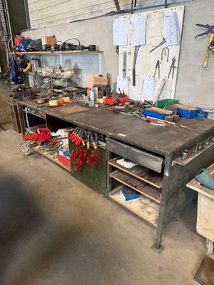 an image of a workbench with many tools on it