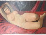 un tableau représentant une femme nue allongée sur une couverture rouge