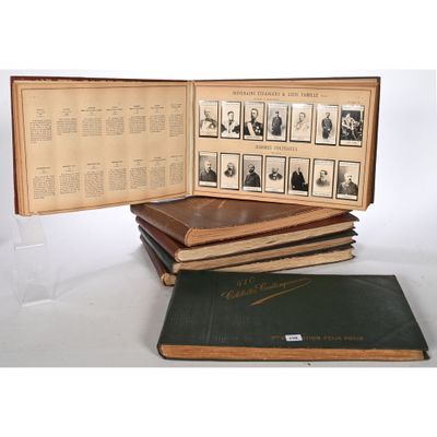 several books are stacked on top of each other on a table