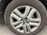 a close up view of a tire on a car