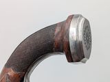 a close up of a gun that is on a table